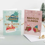 Christmas card 'Nadolig Llawen a Blwyddyn Newydd Dda' bobble hats - gold foil