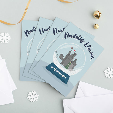 Personalised Welsh Christmas cards - Set of 4 'Nadolig Llawen o...' Snowglobe