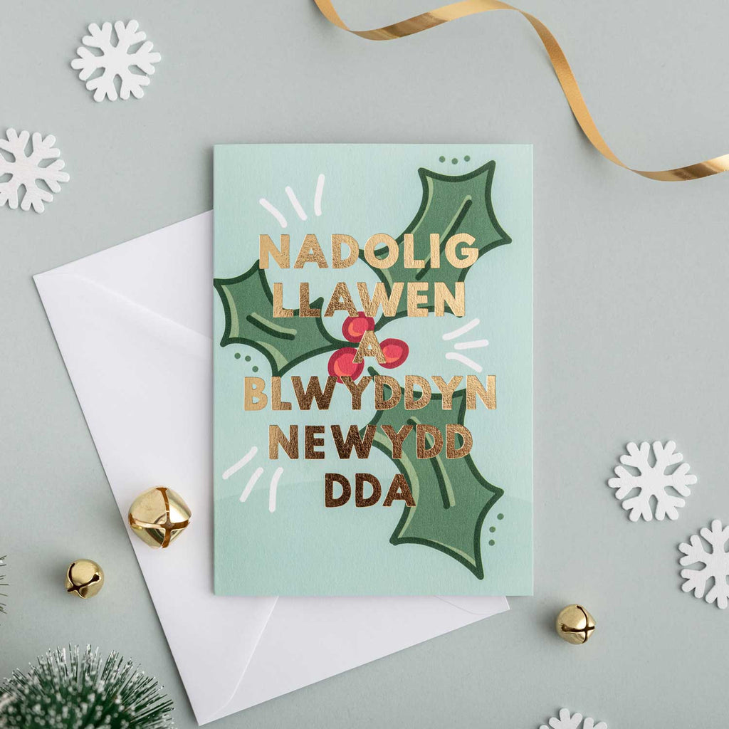 Christmas card 'Nadolig Llawen a Blwyddyn Newydd Dda' holly - gold foil