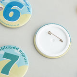 Personalised birthday badge 'Penblwydd Hapus!'