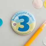Birthday badges Age 3 blue 'Penblwydd Hapus!'